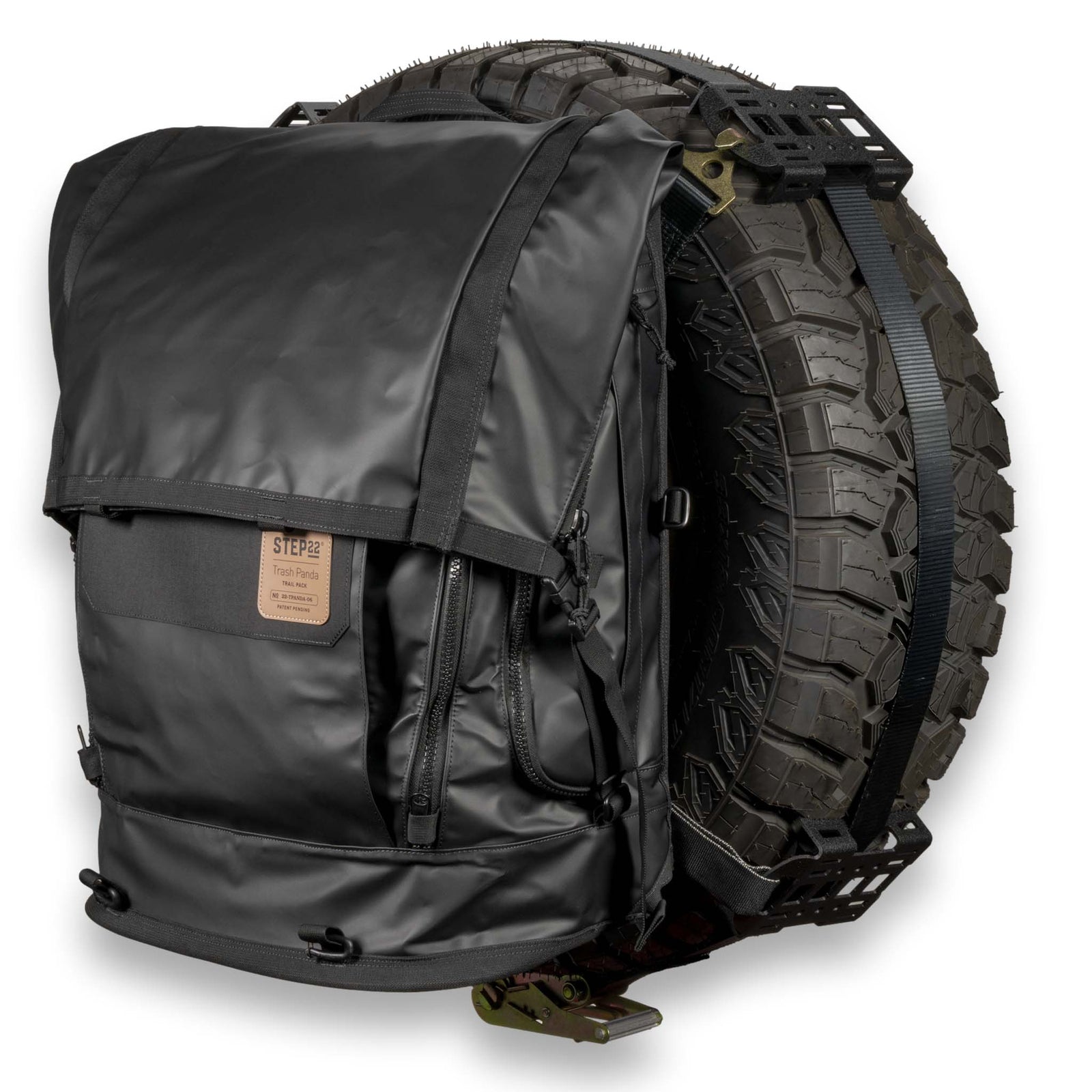 Trash Panda Trail Pack hanging off spare tire ready for trail use