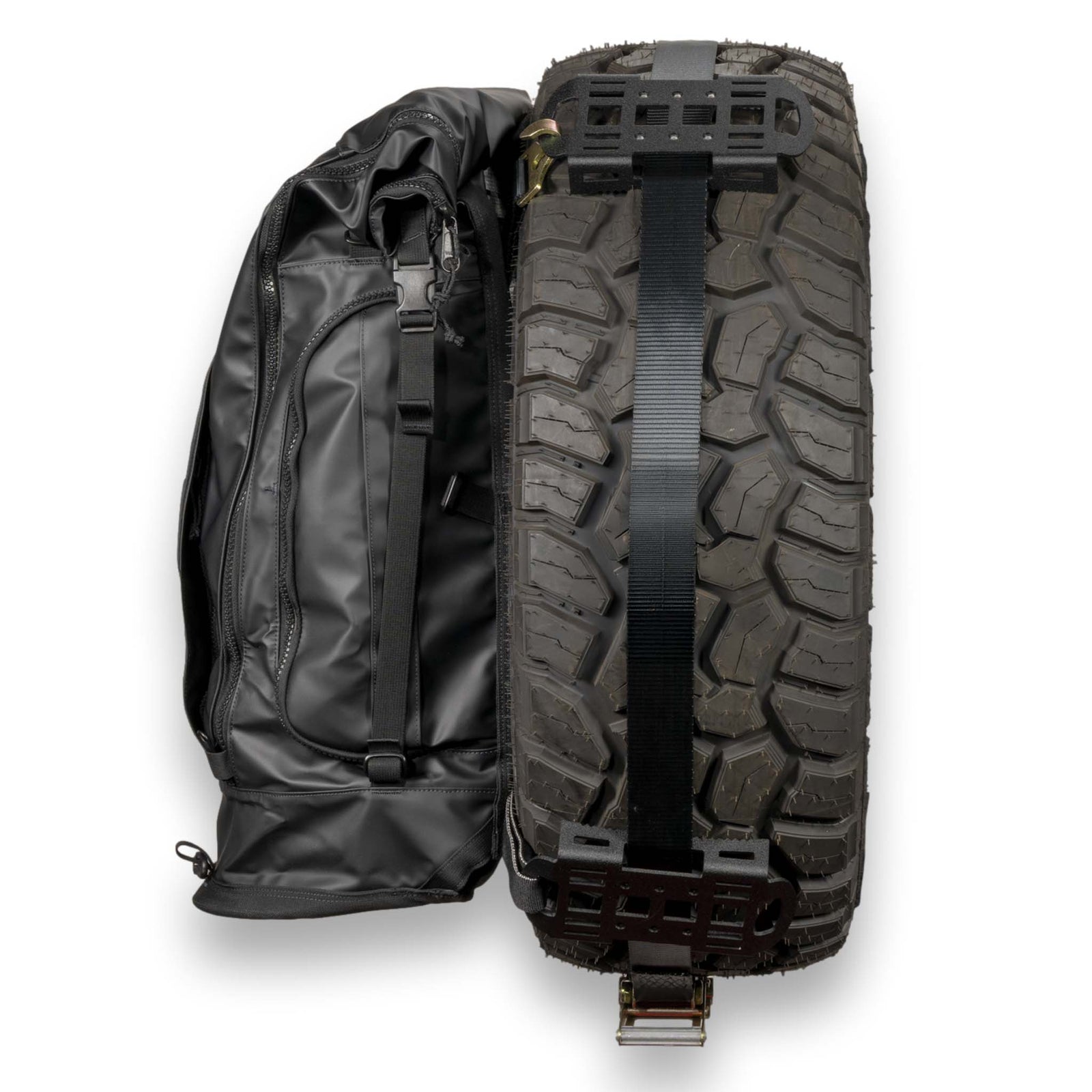 Trash Panda Trail Pack hanging off spare tire ready for trail use