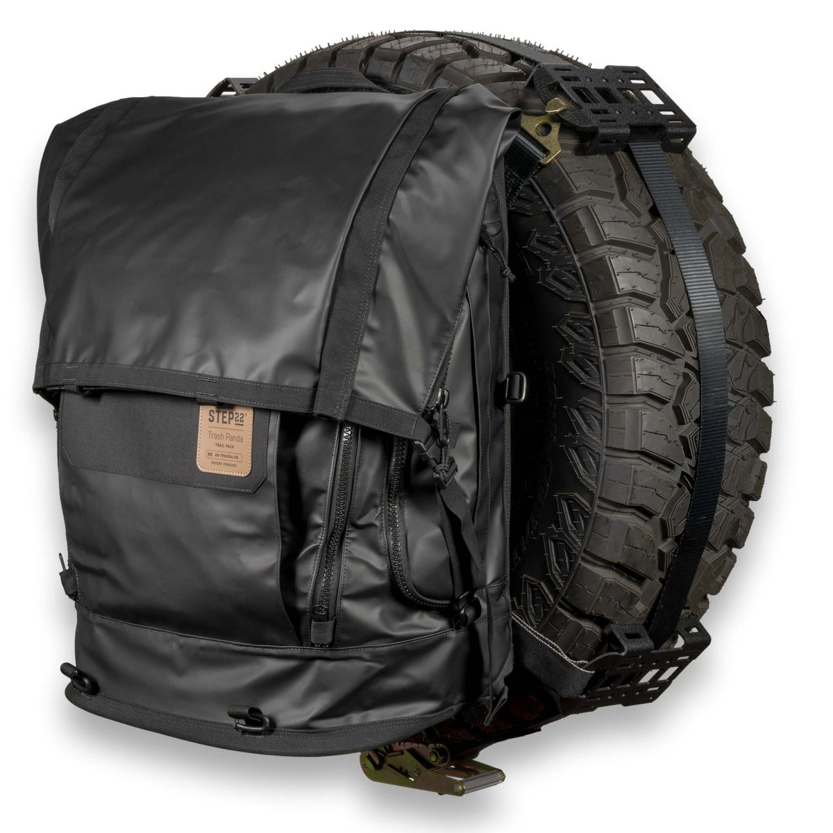 Trash Panda Trail Pack hanging off spare tire ready for trail use