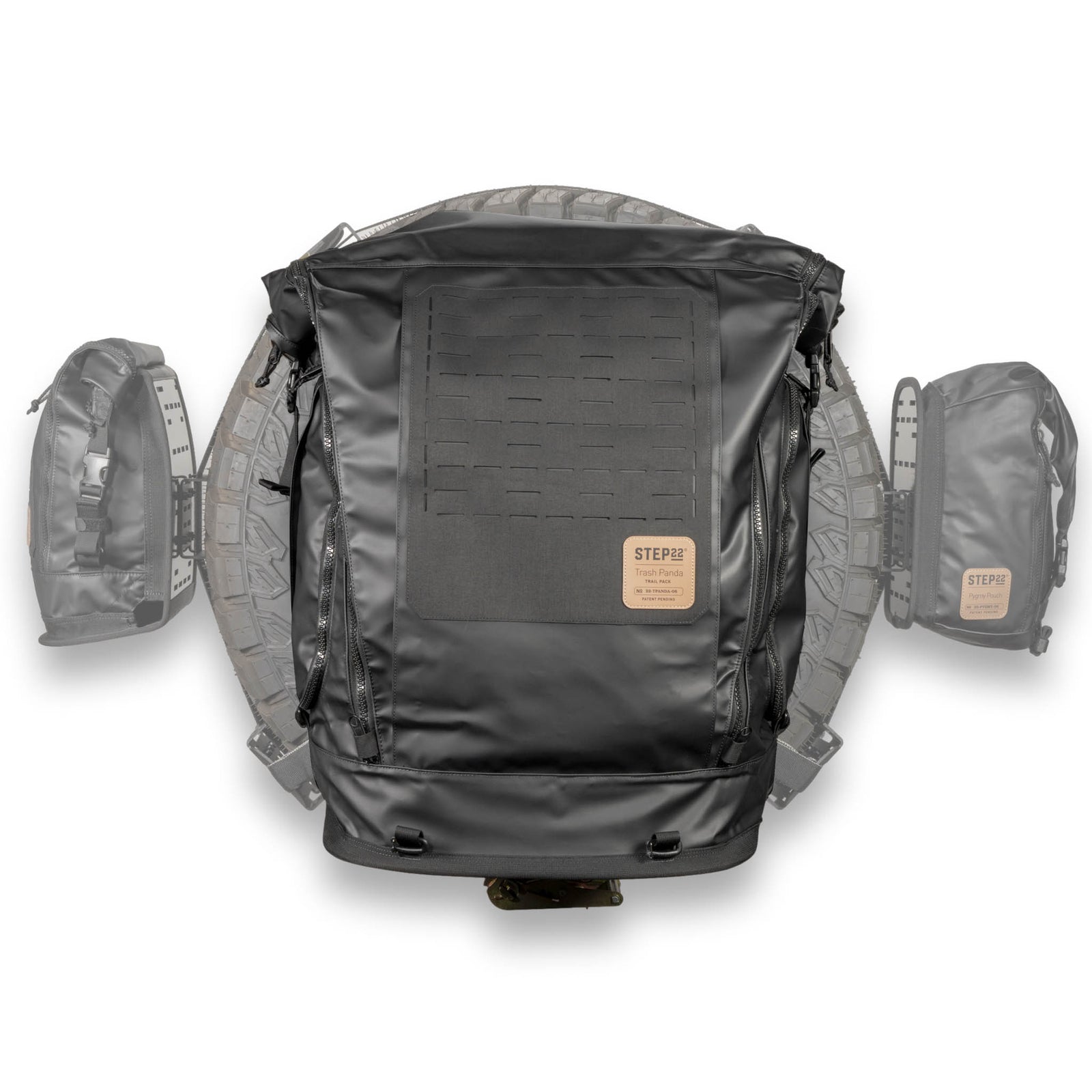 Trash Panda Trail Pack hanging on spare tire ready for trail use